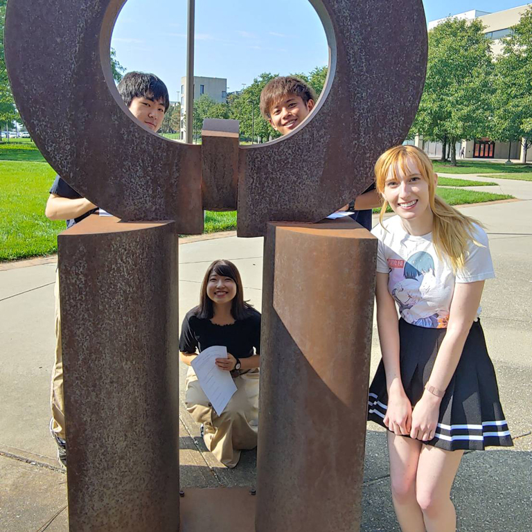 Jennifer Hurley on a scavenger hunt around campus with visiting students from Hakuoh University in Japan.